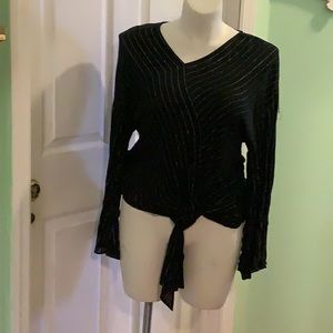 Juicy couture black shiny silver strip down design,you see on pictures.